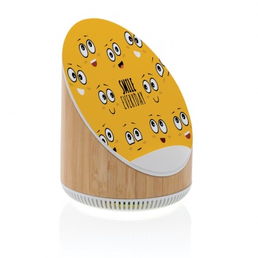 Logotrade meened pilt: Ovate bambusest 5W kõlar koos 15W juhtmevaba laadijaga