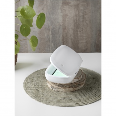 Лого трейд pекламные cувениры фото: УФ-стерилизатор для смартфона Capsule с беспроводным зарядным устройством (5 Вт)