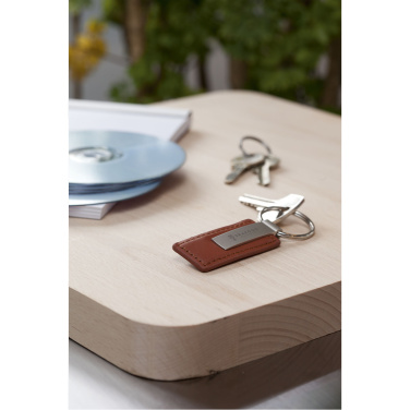 Лого трейд pекламные продукты фото: Брелок LeatherKey